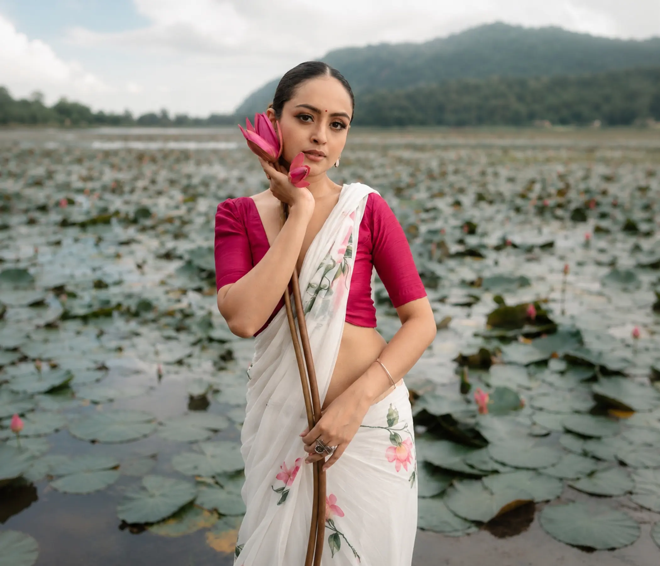 Hand-Painted Pristine White Organza Saree with Pink Lotus Motifs